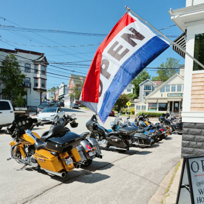 Motorcycle Week in Meredith, New Hampshire, bikes lining the streets.